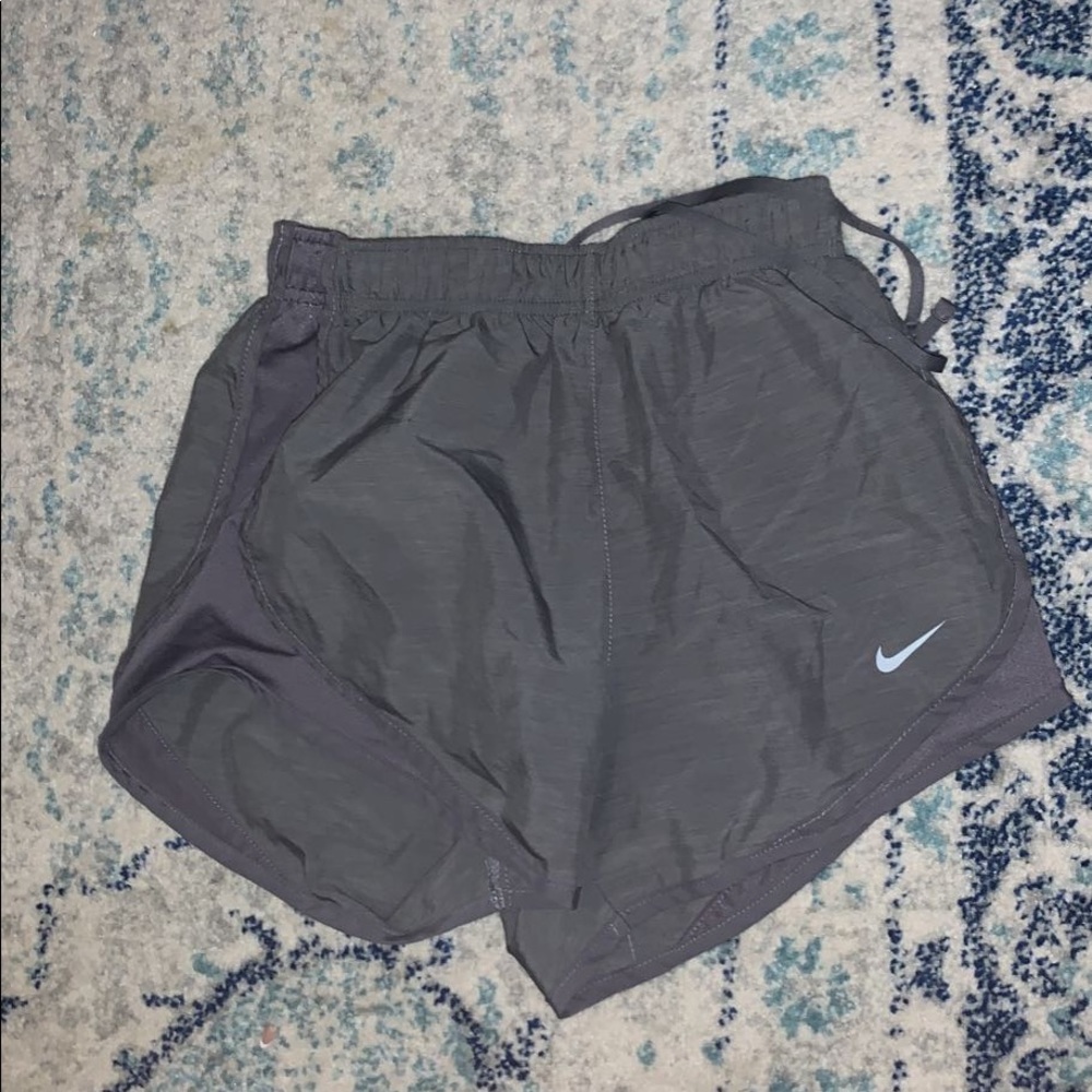Grey NIKE shorts; 3 inches inseam